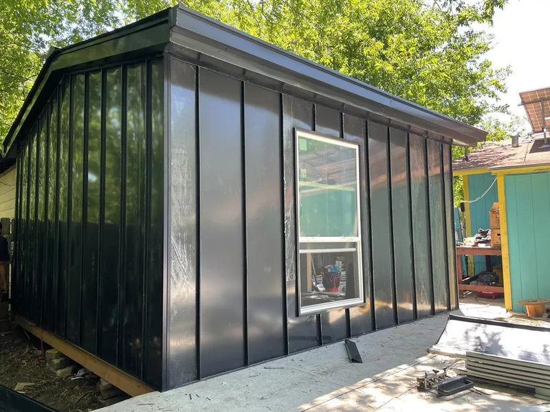 Black standing seam metal wall panels for Roof Inspection in East Hempfield